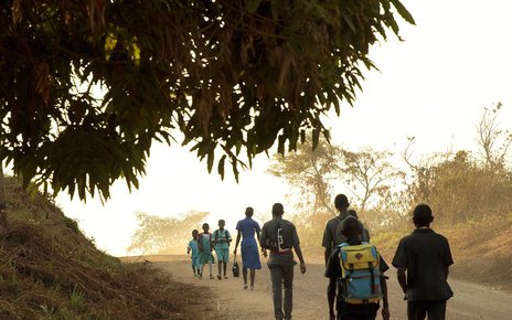 Children walk to school in the morning in the town of Yoko, Cameroon