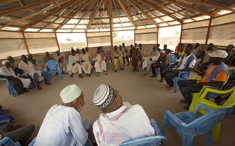 Social workers advocate against child marriage during a meeting in the Gado refugee camp